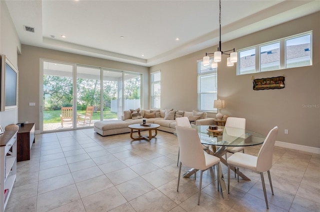 887 Lake Hill Way, Deland, FL 32724 - dining area with light tile patterned floors, recessed lighting, a tray ceiling, and visible vents