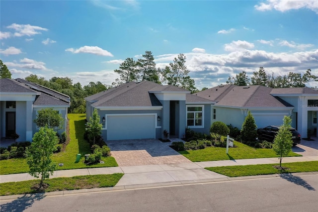 887 Lake Hill Way, Deland, FL 32724 - single story home featuring an attached garage, stucco siding, a shingled roof, a front yard, and driveway