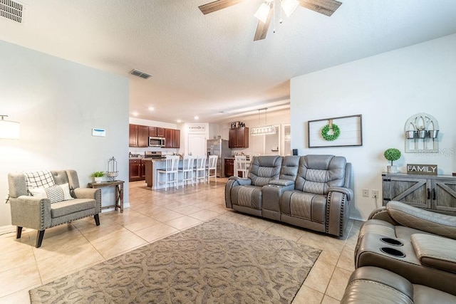 343 Lazio Cir, Debary, FL 32713 - living area with light tile patterned floors, a ceiling fan, recessed lighting, and baseboards