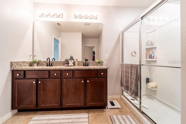 343 Lazio Cir, Debary, FL 32713 - full bathroom featuring a shower stall, tile patterned floors, double vanity, and baseboards