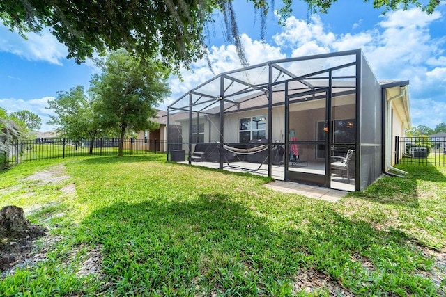 343 Lazio Cir, Debary, FL 32713 - back of house with a patio area, a lanai, and stucco siding