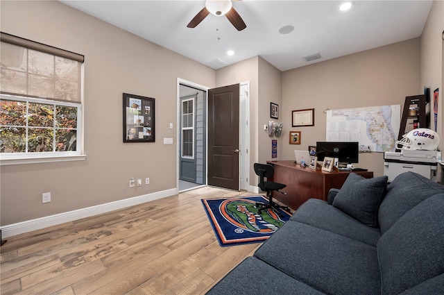 home office with ceiling fan, light wood-style floors, recessed lighting, baseboards, and visible vents