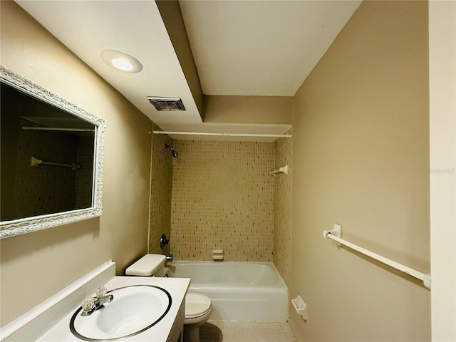 bathroom featuring toilet, shower / tub combination, vanity, visible vents, and tile patterned flooring