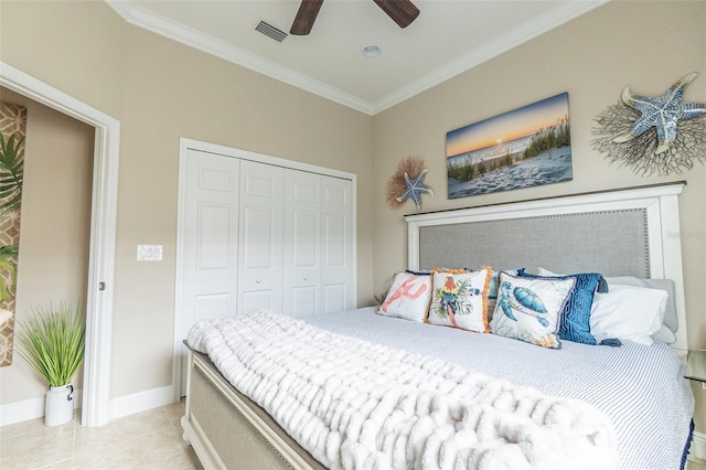 bedroom with a ceiling fan, a closet, ornamental molding, visible vents, and light tile patterned flooring