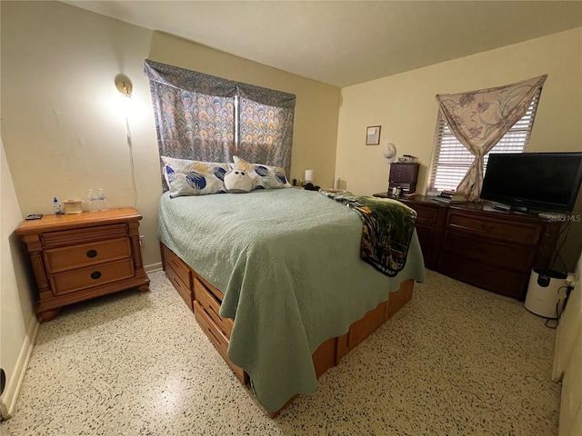 2332 Hadley St, Deltona, FL 32738 - bedroom with dark aggregate flooring and baseboards