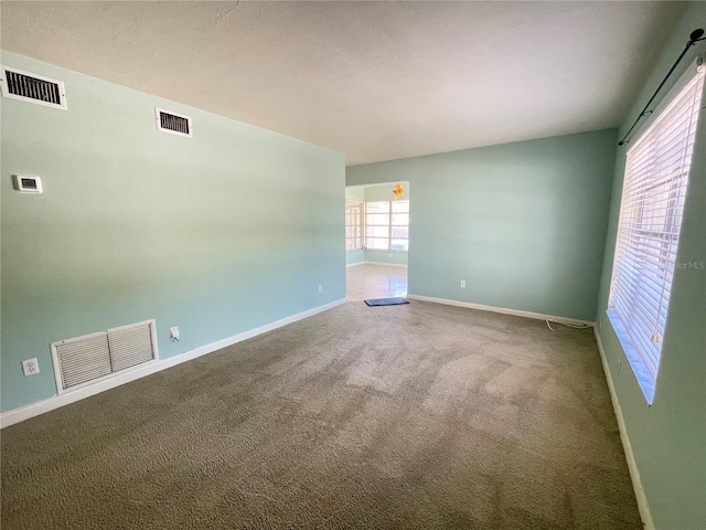 2332 Hadley St, Deltona, FL 32738 - carpeted empty room featuring baseboards