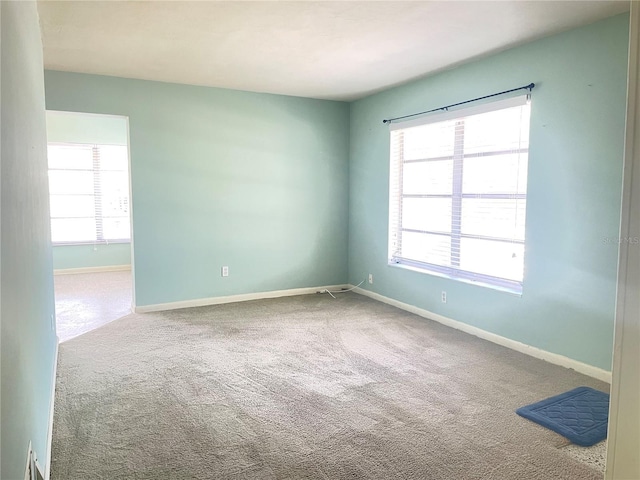 2332 Hadley St, Deltona, FL 32738 - carpeted spare room with baseboards