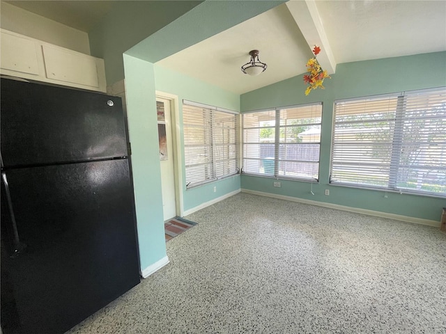 2332 Hadley St, Deltona, FL 32738 - unfurnished dining area with baseboards and speckled floor