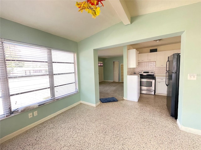 2332 Hadley St, Deltona, FL 32738 - kitchen with electric stove, freestanding refrigerator, white cabinets, and healthy amount of natural light