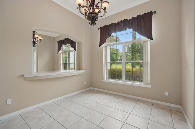 1641 Timber Hills Dr, Deland, FL 32724 - unfurnished dining area with a chandelier, tile patterned flooring, arched walkways, and baseboards