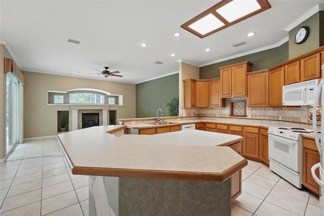 1641 Timber Hills Dr, Deland, FL 32724 - kitchen featuring white appliances, light countertops, light tile patterned floors, ornamental molding, and a sink