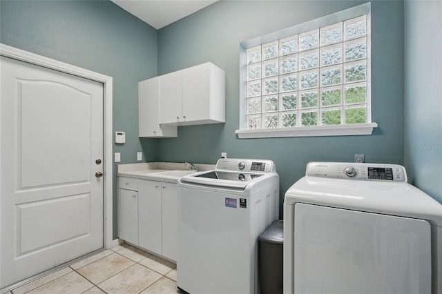 1641 Timber Hills Dr, Deland, FL 32724 - laundry area with cabinet space, independent washer and dryer, and light tile patterned flooring