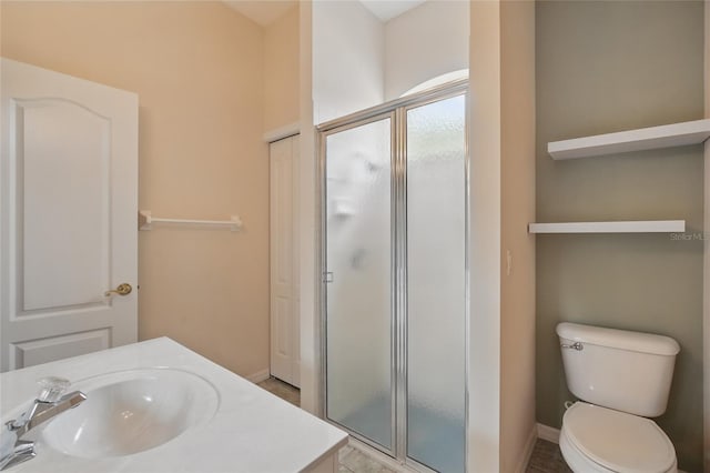 1641 Timber Hills Dr, Deland, FL 32724 - bathroom with a sink, a stall shower, toilet, and baseboards