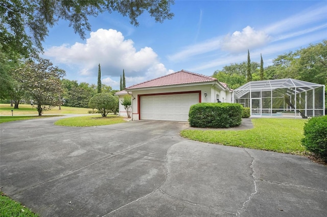1641 Timber Hills Dr, Deland, FL 32724 - view of front of house with a tile roof, concrete driveway, stucco siding, and a front yard