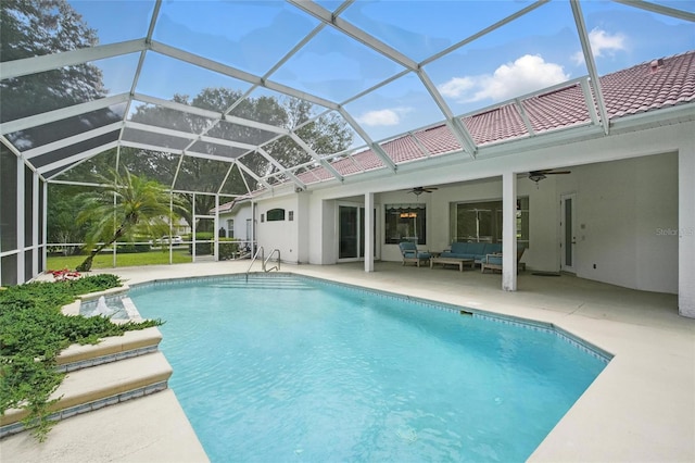 1641 Timber Hills Dr, Deland, FL 32724 - outdoor pool with a ceiling fan, outdoor lounge area, a patio area, and glass enclosure