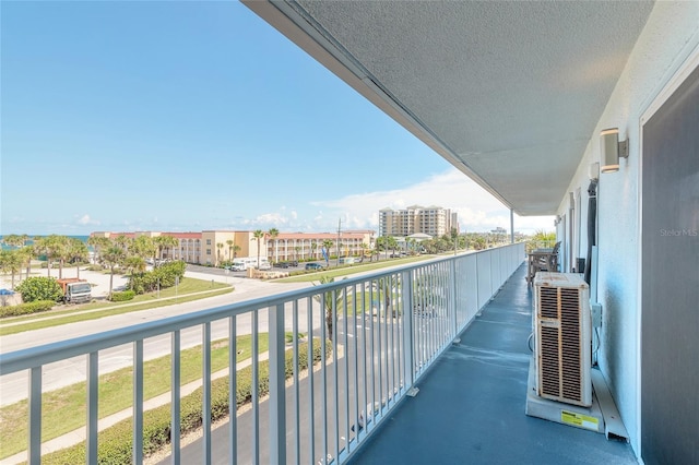 balcony featuring ac unit