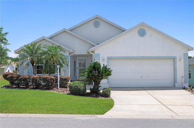 11094 SE 173rd Ln, Summerfield, FL 34491 - ranch-style house featuring a garage, stucco siding, driveway, and a front yard