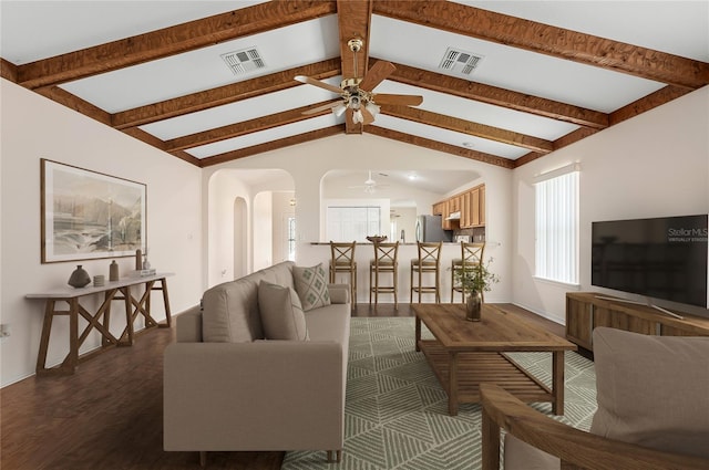11094 SE 173rd Ln, Summerfield, FL 34491 - living area featuring a ceiling fan, dark wood-type flooring, baseboards, and arched walkways