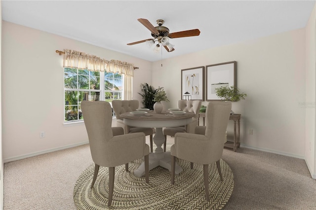11094 SE 173rd Ln, Summerfield, FL 34491 - carpeted dining area with a ceiling fan and baseboards