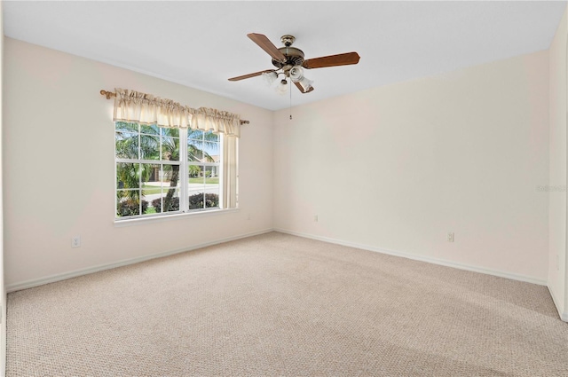 11094 SE 173rd Ln, Summerfield, FL 34491 - unfurnished room featuring light carpet, ceiling fan, and baseboards