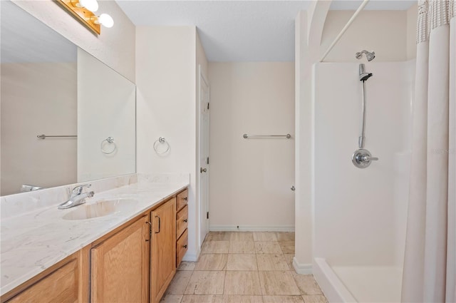 11094 SE 173rd Ln, Summerfield, FL 34491 - bathroom with a shower, vanity, and baseboards