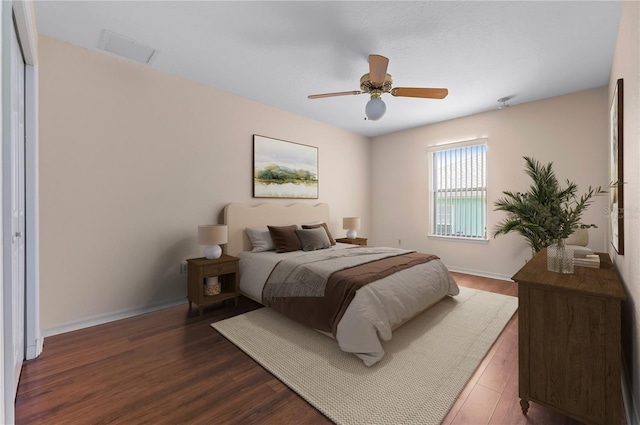 11094 SE 173rd Ln, Summerfield, FL 34491 - bedroom featuring wood finished floors, baseboards, and ceiling fan