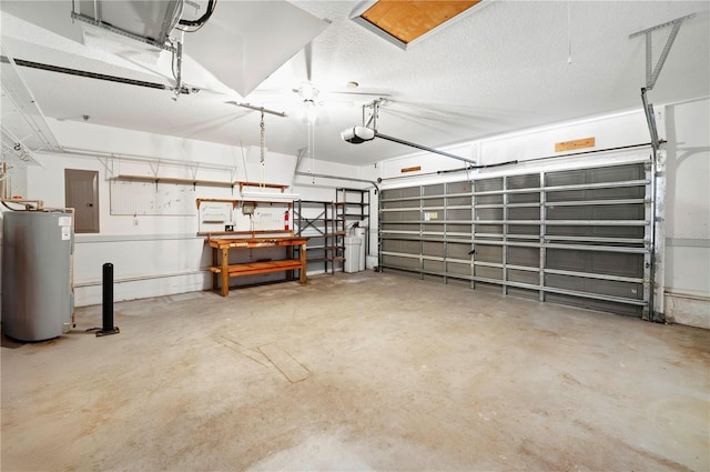 11094 SE 173rd Ln, Summerfield, FL 34491 - garage featuring water heater, a garage door opener, and electric panel