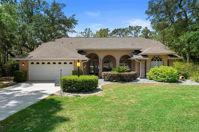 3510 W Cogwood Cir, Beverly Hills, FL 34465 - single story home with an attached garage, concrete driveway, stucco siding, a front lawn, and a shingled roof