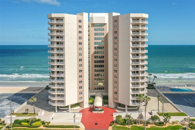 2967 S Atlantic Ave Unit 1601, Daytona Beach Shores, FL 32118 - view of building exterior featuring a water view and a view of the beach