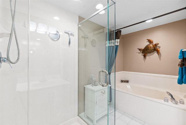 2967 S Atlantic Ave Unit 1601, Daytona Beach Shores, FL 32118 - bathroom with a shower stall, tile patterned flooring, and a bath
