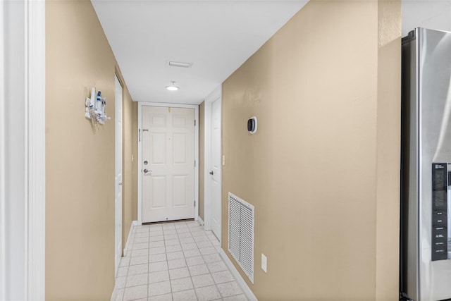 2967 S Atlantic Ave Unit 1601, Daytona Beach Shores, FL 32118 - corridor with light tile patterned floors, baseboards, and visible vents