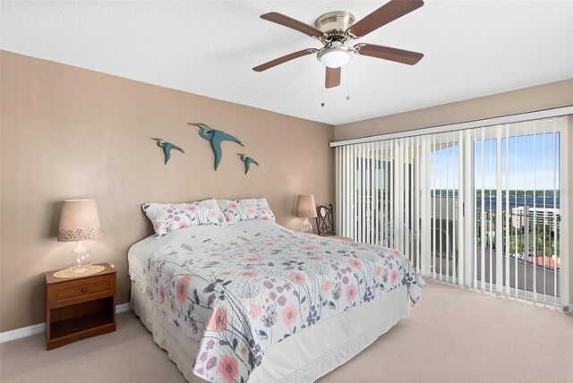 2967 S Atlantic Ave Unit 1601, Daytona Beach Shores, FL 32118 - bedroom featuring carpet, baseboards, and ceiling fan