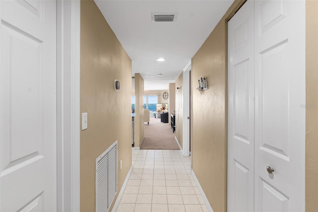 2967 S Atlantic Ave Unit 1601, Daytona Beach Shores, FL 32118 - hall with visible vents, baseboards, light tile patterned flooring, and recessed lighting
