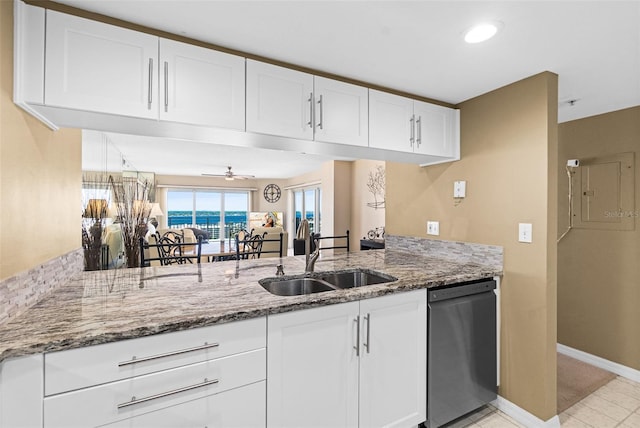 2967 S Atlantic Ave Unit 1601, Daytona Beach Shores, FL 32118 - kitchen with a sink, light stone countertops, white cabinetry, and dishwasher
