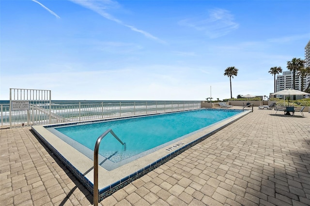 2967 S Atlantic Ave Unit 1601, Daytona Beach Shores, FL 32118 - pool featuring a patio area and fence