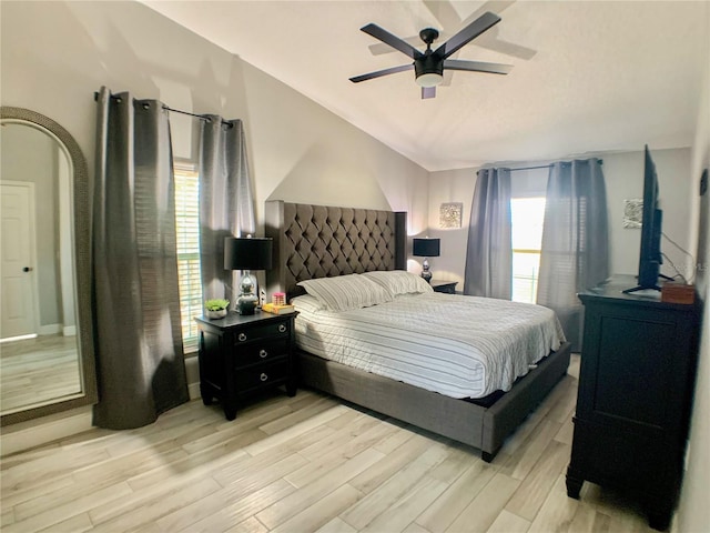 bedroom with light wood-type flooring and ceiling fan
