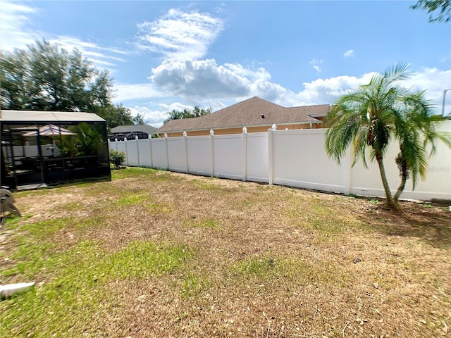 view of yard featuring fence private yard and a gazebo