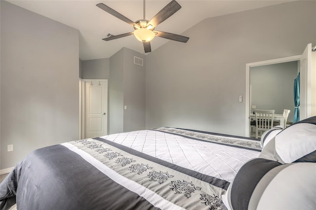 85 Pheasant Dr, Palm Coast, FL 32164 - bedroom with lofted ceiling and ceiling fan