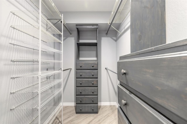 85 Pheasant Dr, Palm Coast, FL 32164 - spacious closet featuring wood finished floors