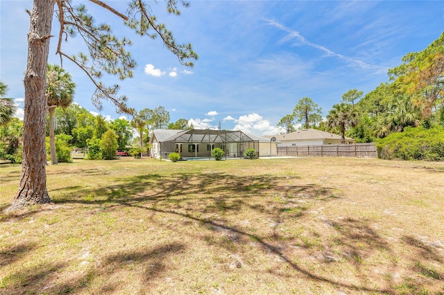 85 Pheasant Dr, Palm Coast, FL 32164 - view of yard featuring glass enclosure