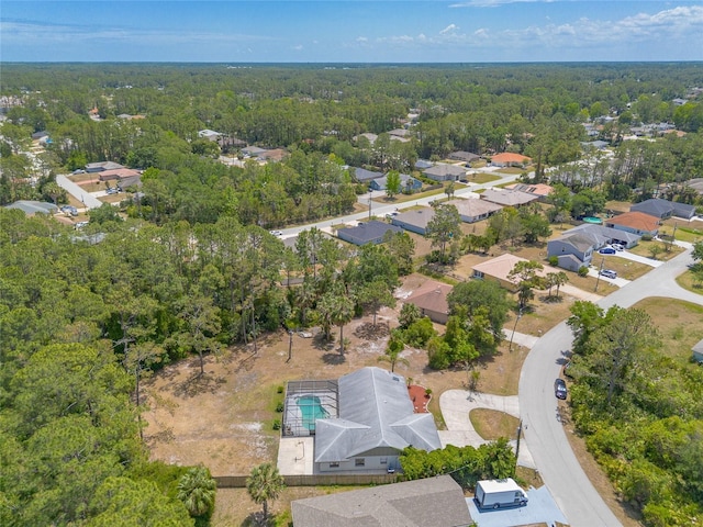 85 Pheasant Dr, Palm Coast, FL 32164 - aerial view of residential area featuring a heavily wooded area