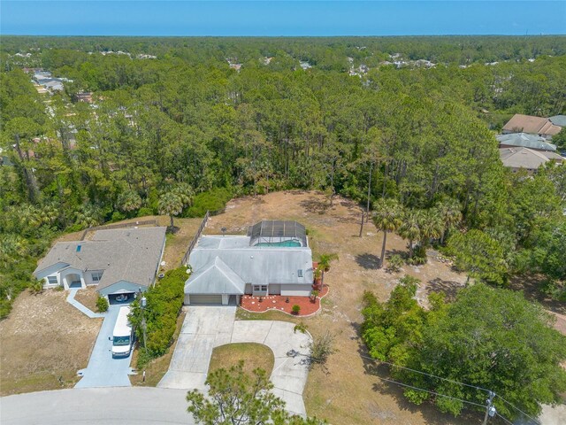 85 Pheasant Dr, Palm Coast, FL 32164 - bird's eye view of a heavily wooded area