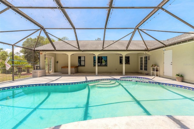85 Pheasant Dr, Palm Coast, FL 32164 - view of pool featuring french doors, a patio, a lanai, a pool with connected hot tub, and ceiling fan