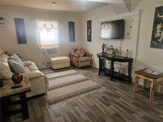 317 Inwood Ave, New Smyrna Beach, FL 32168 - living area featuring wood finished floors, cooling unit, a textured wall, and a textured ceiling