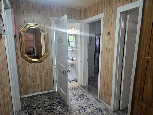 317 Inwood Ave, New Smyrna Beach, FL 32168 - hall featuring wood walls and baseboards
