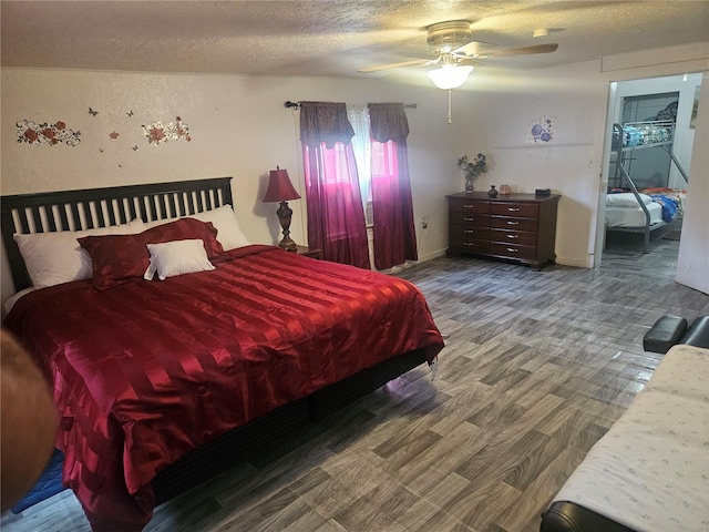 317 Inwood Ave, New Smyrna Beach, FL 32168 - bedroom with a textured ceiling and ceiling fan