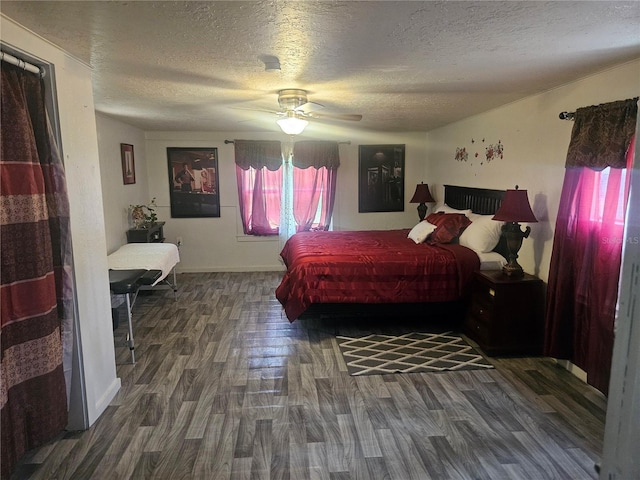 317 Inwood Ave, New Smyrna Beach, FL 32168 - bedroom featuring a textured ceiling, wood finished floors, ceiling fan, and baseboards