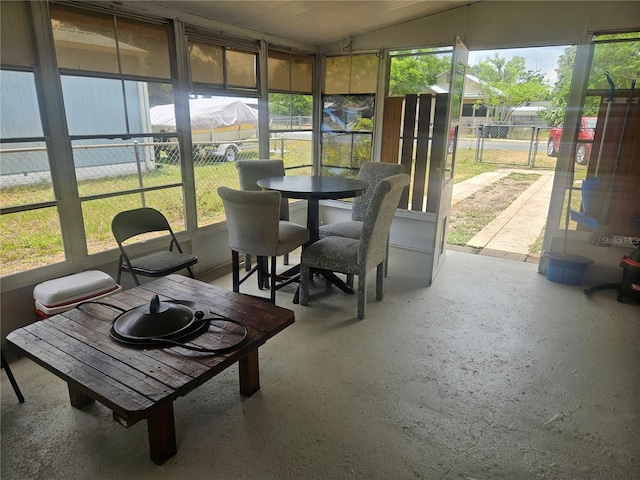 317 Inwood Ave, New Smyrna Beach, FL 32168 - sunroom / solarium with vaulted ceiling and outdoor dining space