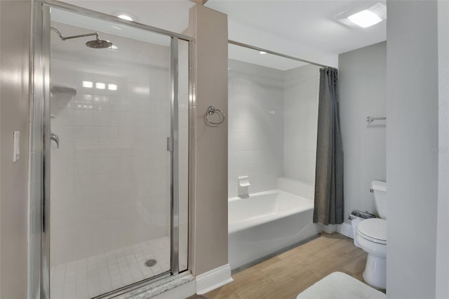 full bath featuring toilet, baseboards, and wood finished floors