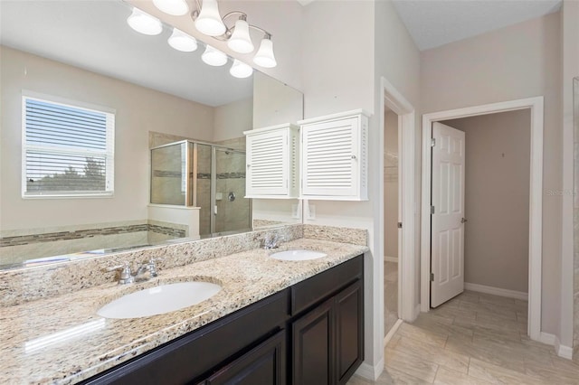 1480 Leitrim Loop, Apopka, FL 32703 - full bathroom featuring a sink, double vanity, a stall shower, and a garden tub